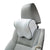 Car headrest pillow on a gray car seat with a white background