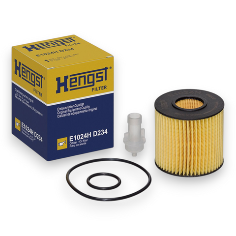 Hengst Filter E1024H D234 oil filter kit with its original packaging box, showing the yellow and blue box, the pleated yellow filter, a white plastic cap, and two black rubber O-rings on a white background.