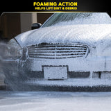 Meguiar's Gold Class Car Wash Shampoo 1.89 L Car being washed with soapy water, showing foaming action on a black background.