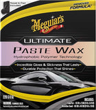 Meguiar's Ultimate Paste Wax packaging box, 226 g, featuring a black and yellow design with a black sports car graphic and product details.