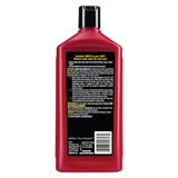 A red bottle of Dragon's Sprinkle 1000 water hardener with a black cap, shown from the back against a white background, featuring a large black product information label.