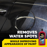 Car with water spots being removed by a bottle of car care product.