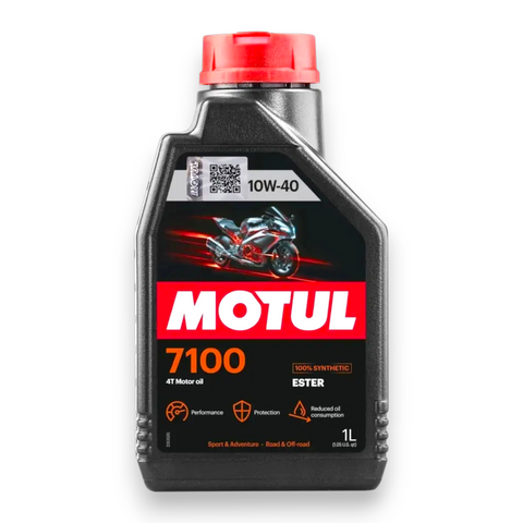 A bottle of MOTUL 7100 4T Motor Oil Ester, featuring a black plastic container with a red cap and a black label with a red and white logo, on a white background.
