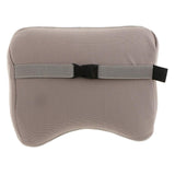 Gray travel pillow with a black strap on a white background