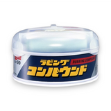 Rubbing compound jar with Japanese text on a white background