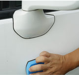Person cleaning a car door with a blue sponge, with text indicating it's for white cars.